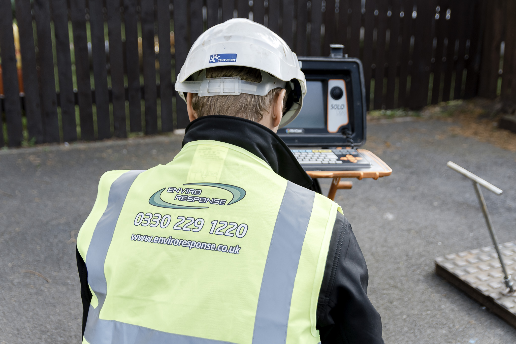 Enviro Response engineer carrying out a drainage survey